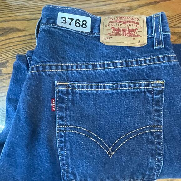 Levis 577 Jeans Womens 32 Medium Blue Loose Fit Lower Rise Crop Raw Hem Straight - Picture 11 of 11